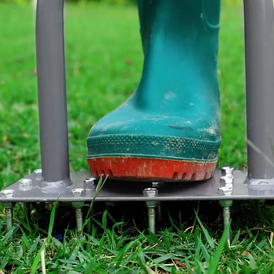 Spike lawn aerator with 15 iron spikes